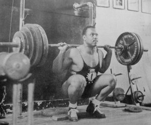 John Davis performing a squat